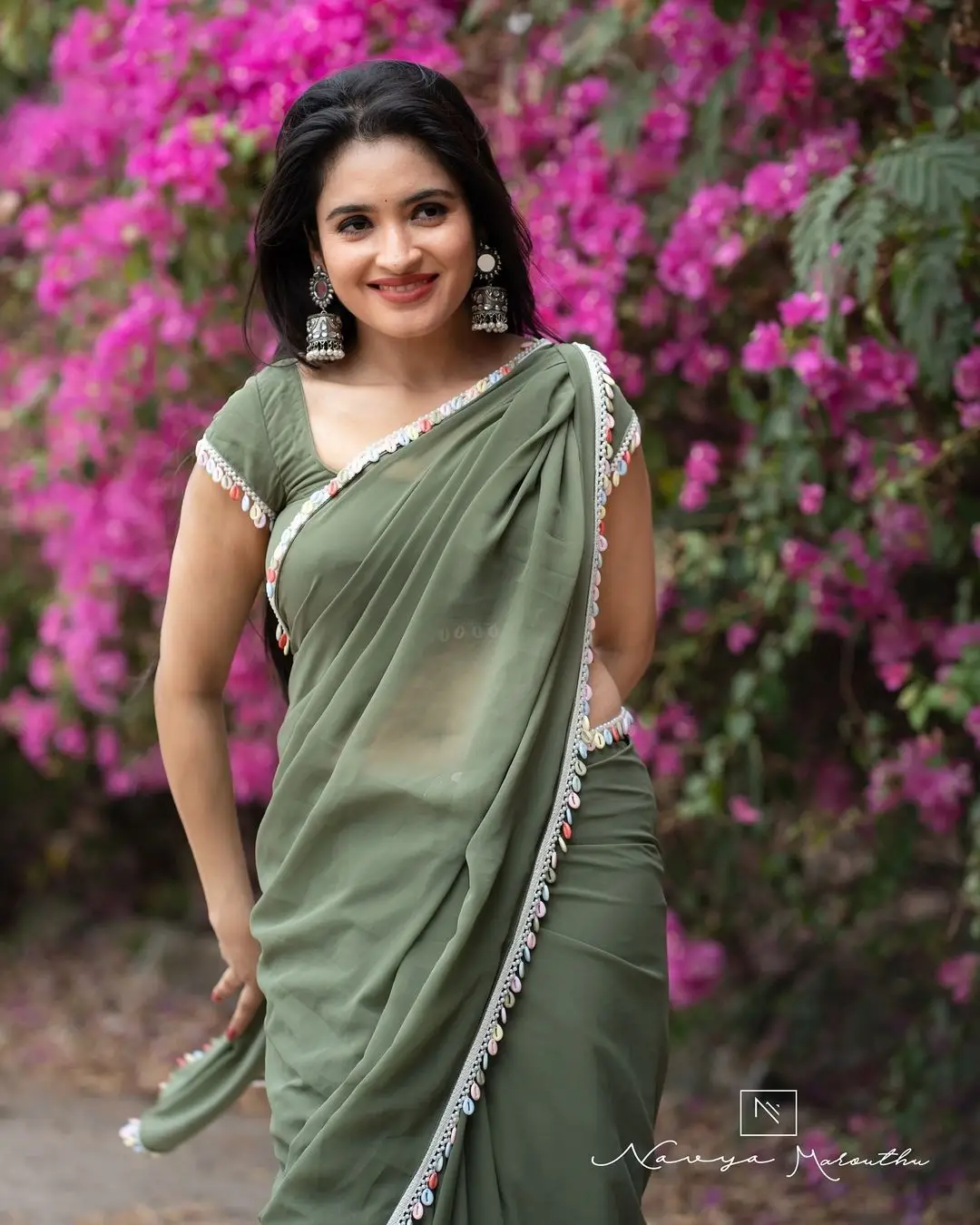 RATHIKA ROSE WEARING GREEN SAREE SLEEVELESS BLOUSE